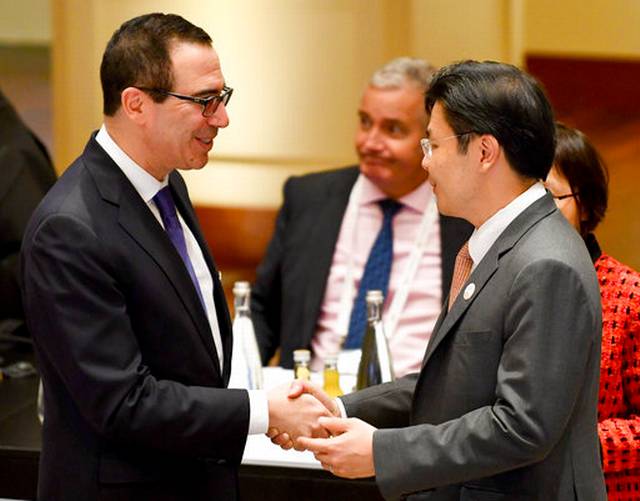 Global finance gathering struggles to define trade stance